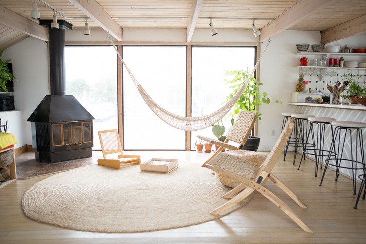 hammock-near-the-window-of-a-house-boat