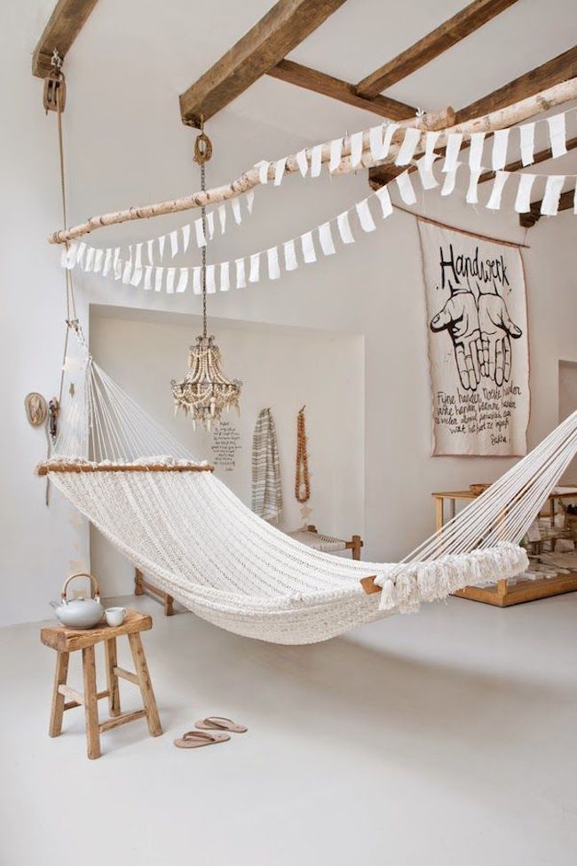 large-hammock-in-white-room-with-wood-accents