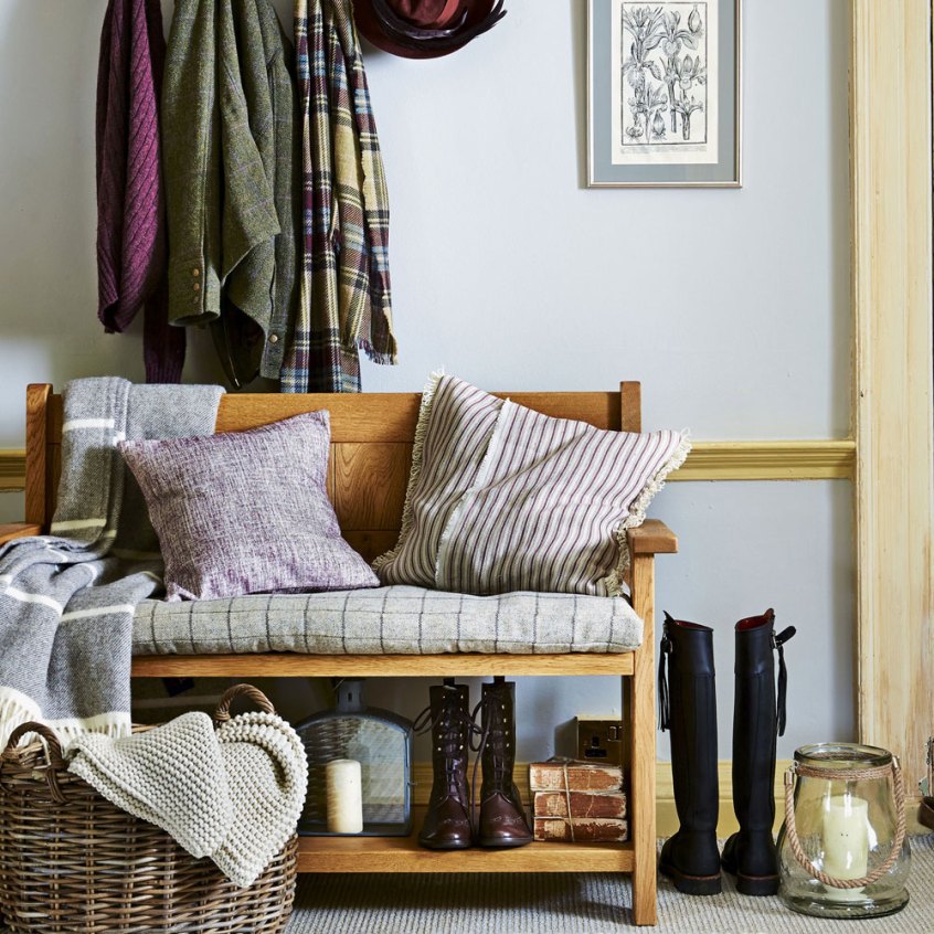 Grey-country-hallway-with-wooden-bench