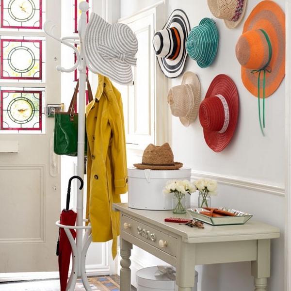 scandinavian-hallway-design-with-white-interior-color-decorating-ideas-plus-small-wooden-table-with-drawer-and-wood-umbrella-stand-combined-with-bag-hat-and-clothing-hooks
